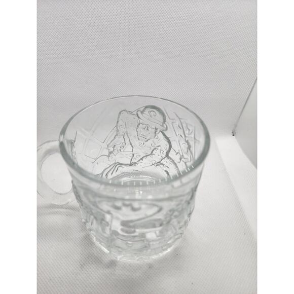 MUG/CUP-BATMAN FOREVER-THE RIDDLER-McDonalds-Clear Glass-Embossed-1995 - Picture 1 of 6